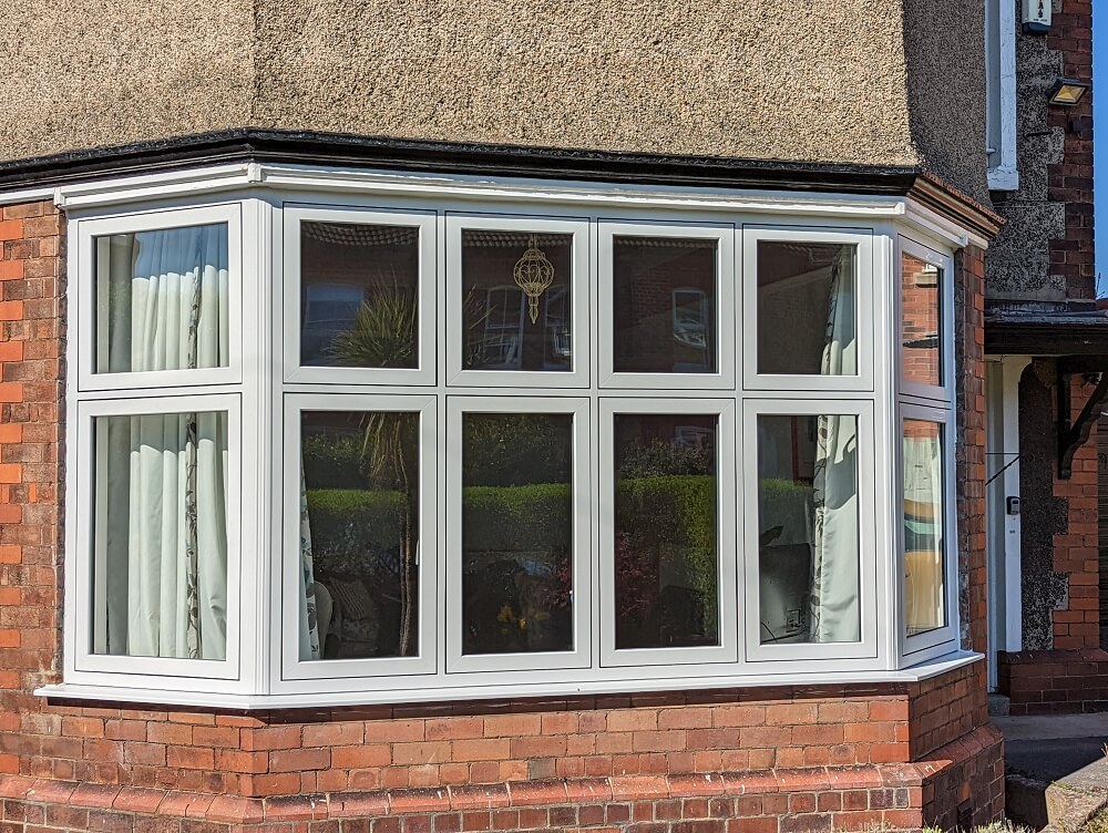 white flush sash bay window