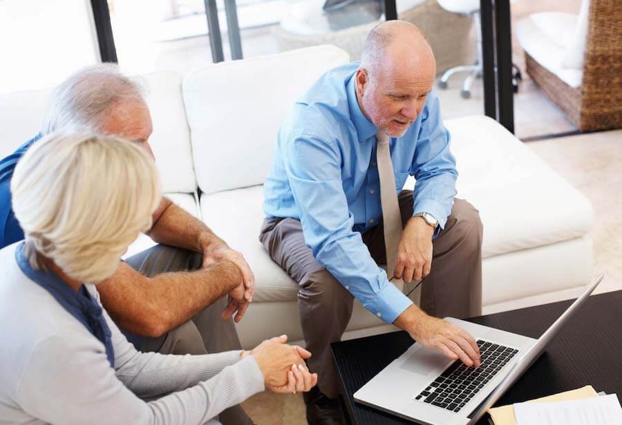 Sales person with couple