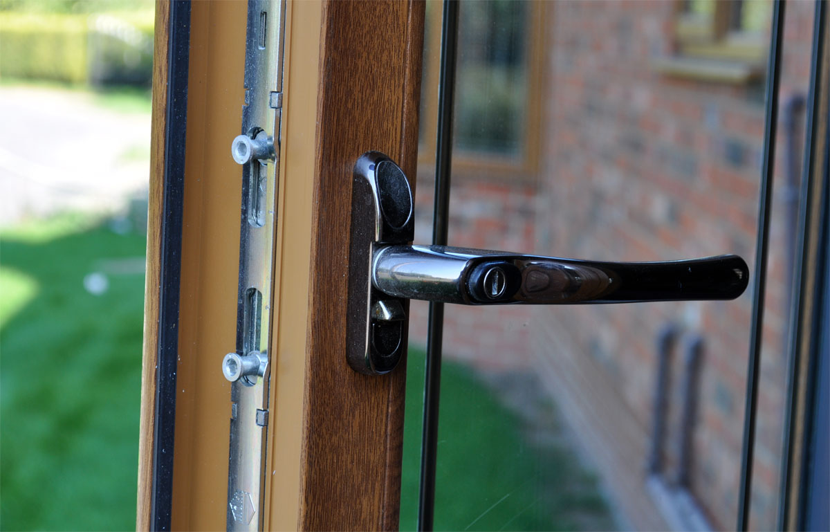 Oak window close up of handle lock