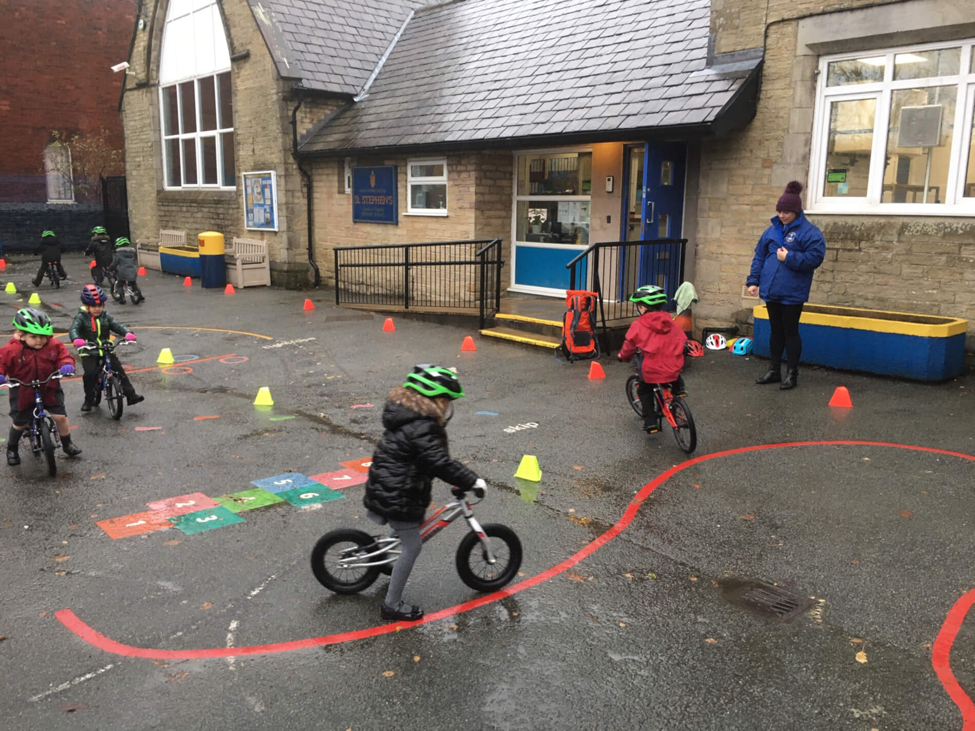 Droylsden Glass at St stephens school - children on bikes